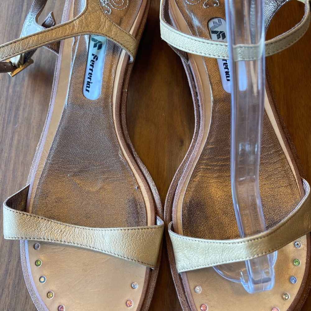 Ferrerias gold sandals.  Size 8.